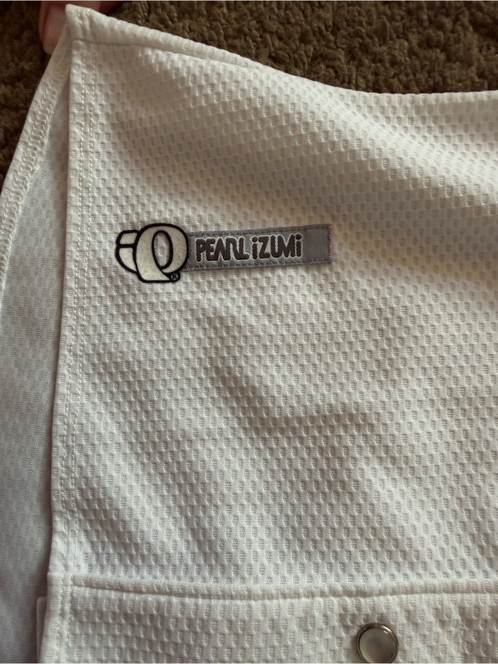 Pearl Izumi White Short-Sleeve Button-Front Top with Light Purple Accents - Picture 3 of 10